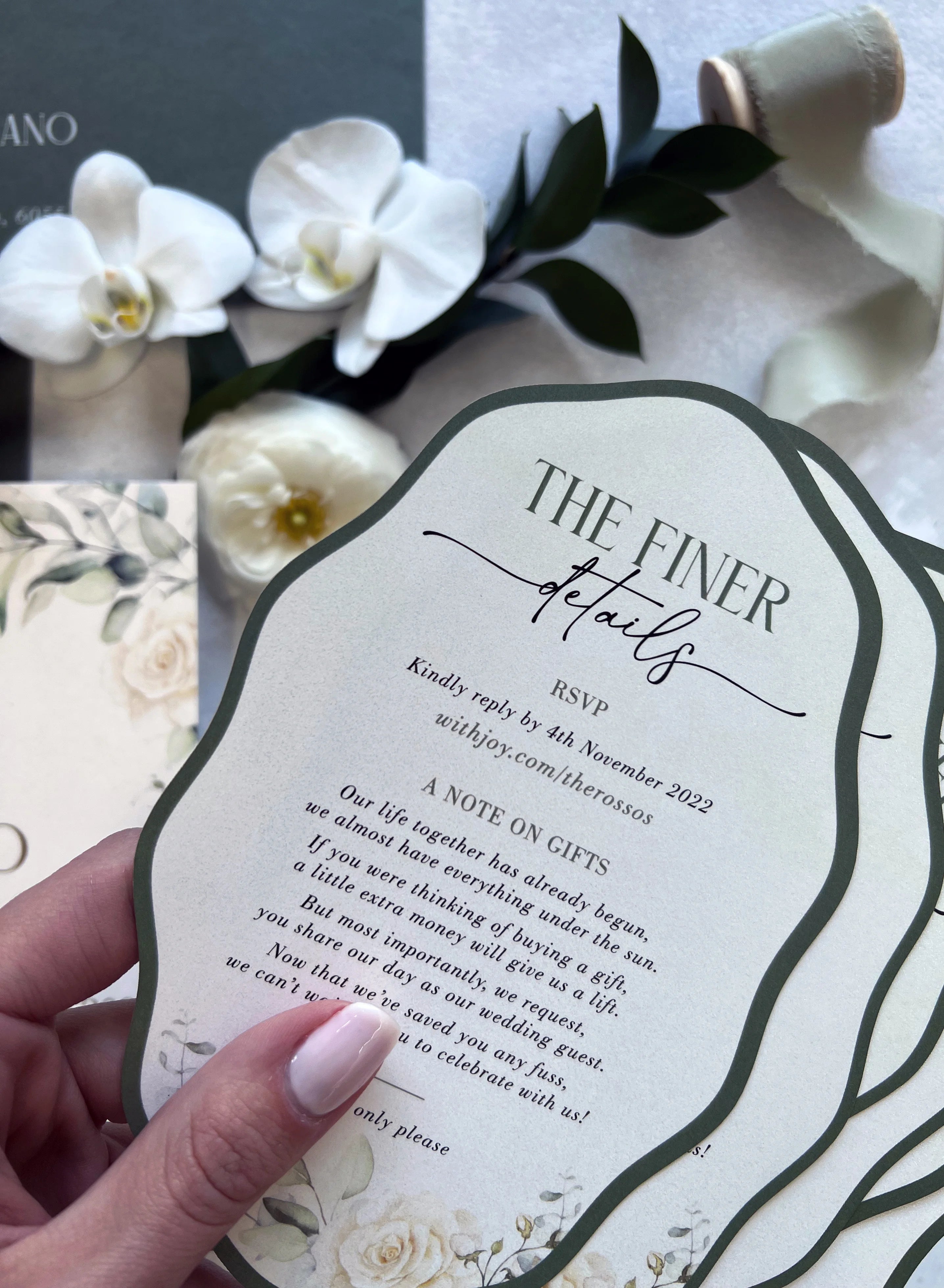 The Sintra Suite The Finer Details information card with botanical illustrations and white orchids by Felicitations