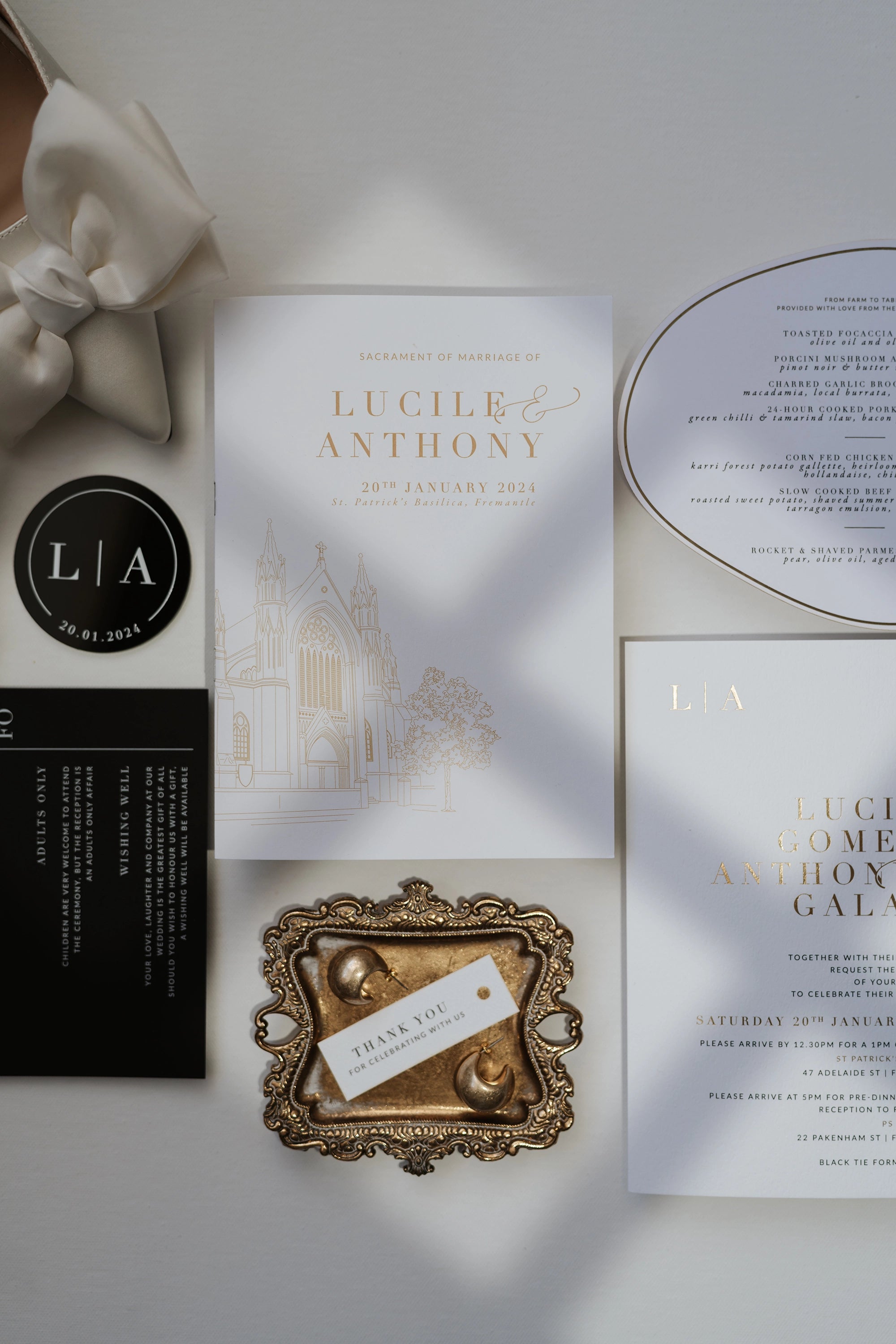 The Zurich Suite gold foil ceremony booklet with venue illustration of St Patricks Basilica Fremantle by Felicitations