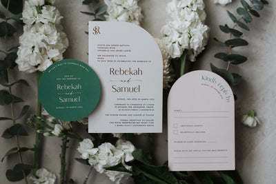 Tailored Touch wedding invitation suite with arch invite green circle save the date and RSVP card surrounded by white roses and eucalyptus by Felicitations