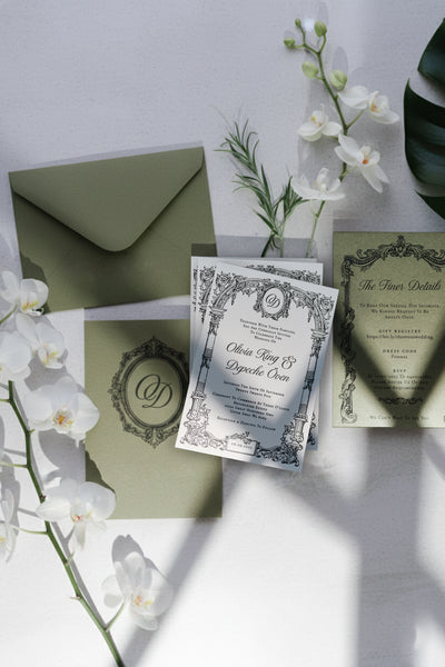 The Bordeaux Suite full wedding suite with olive envelope ornate invitation finer details card and white orchids by Felicitations