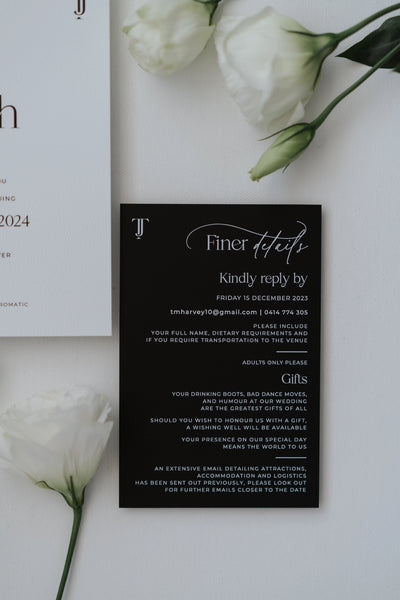 The Copenhagen Suite black finer details RSVP card with elegant typography by Felicitations Wedding Stationery