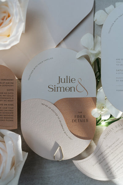 The Dolomites Suite arch shaped wedding invitation for Julie and Simon with copper foil detail and finer details card by Felicitations