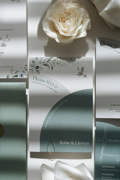 The Garda Suite Please RSVP arch card with sage green and watercolor eucalyptus for Kobie and Llewyn by Felicitations