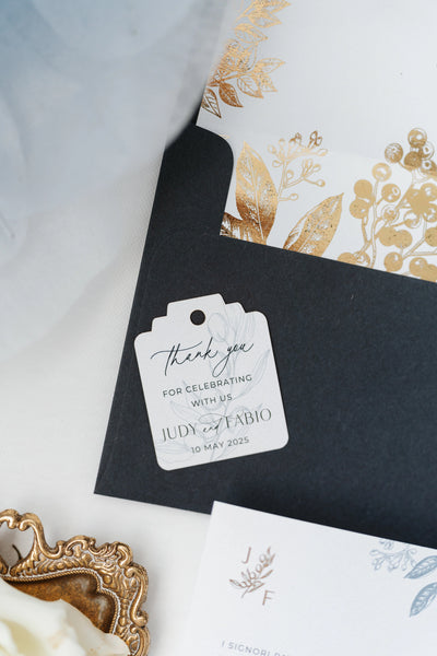 The Geneva Suite thank you tag with calligraphy on black envelope with gold foil envelope liner by Felicitations Wedding Stationery