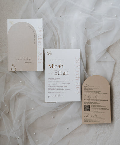 The Matera Suite full wedding stationery set with cream arch invitation seat card and finer details card on tulle by Felicitations