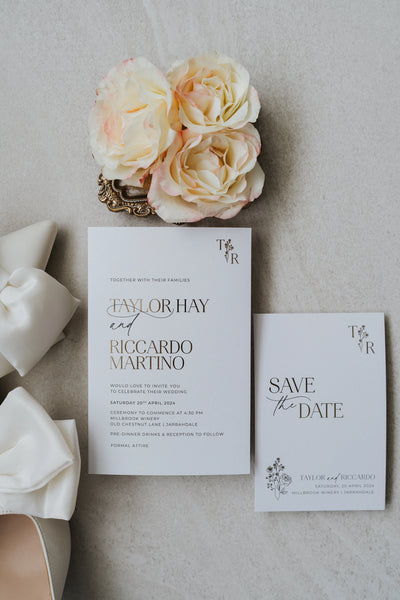 The Paris suite invitation and save the date for Taylor Hay and Riccardo Martino, refined gold foil details on cream cardstock with floral monogram