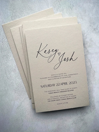 The Portofino Suite stack of cream wedding invitations with calligraphy script Kasey and Josh Cable Beach Broome by Felicitations