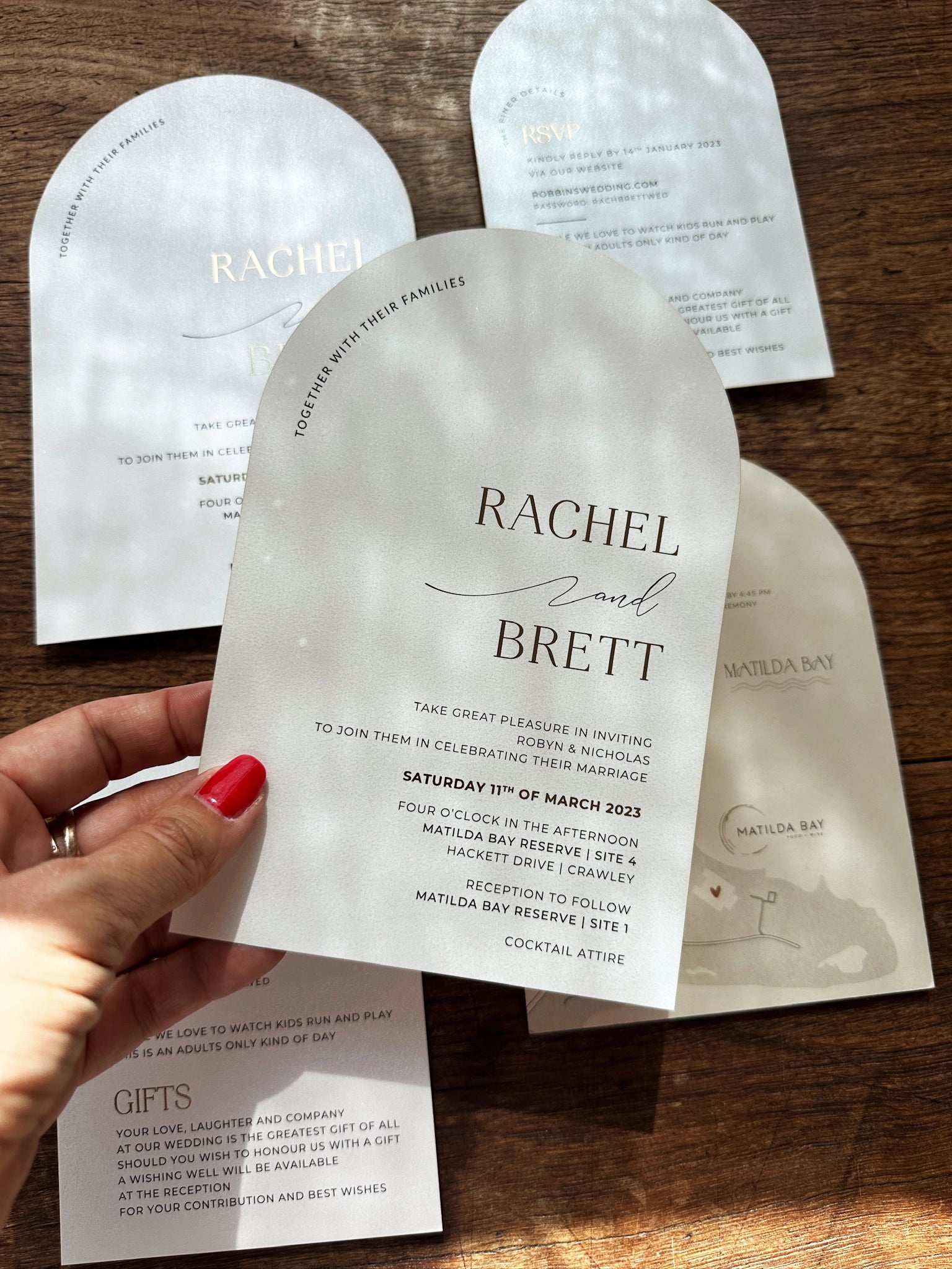 The Santorini Suite shimmer arch wedding invitation for Rachel and Brett at Matilda Bay Reserve with map card and gifts info by Felicitations