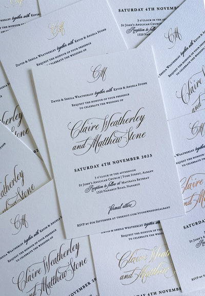 The Venice Suite stack of wedding invitations with gold foil calligraphy CM monogram by Felicitations