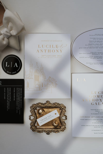 The Zurich Suite gold foil ceremony booklet with venue illustration of St Patricks Basilica Fremantle by Felicitations